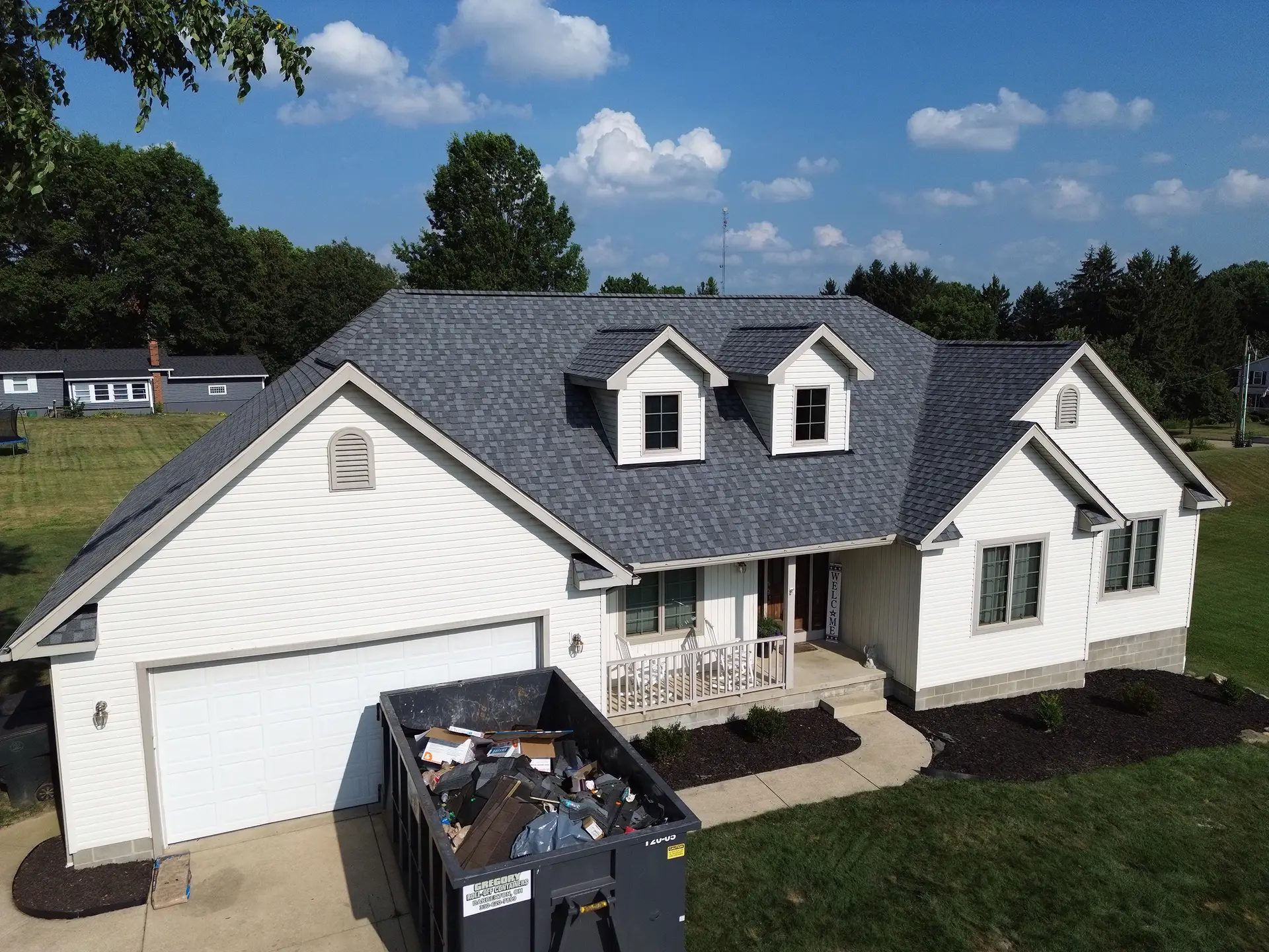 Rise Roofing crew completing a shingle roof in Northeast Ohio